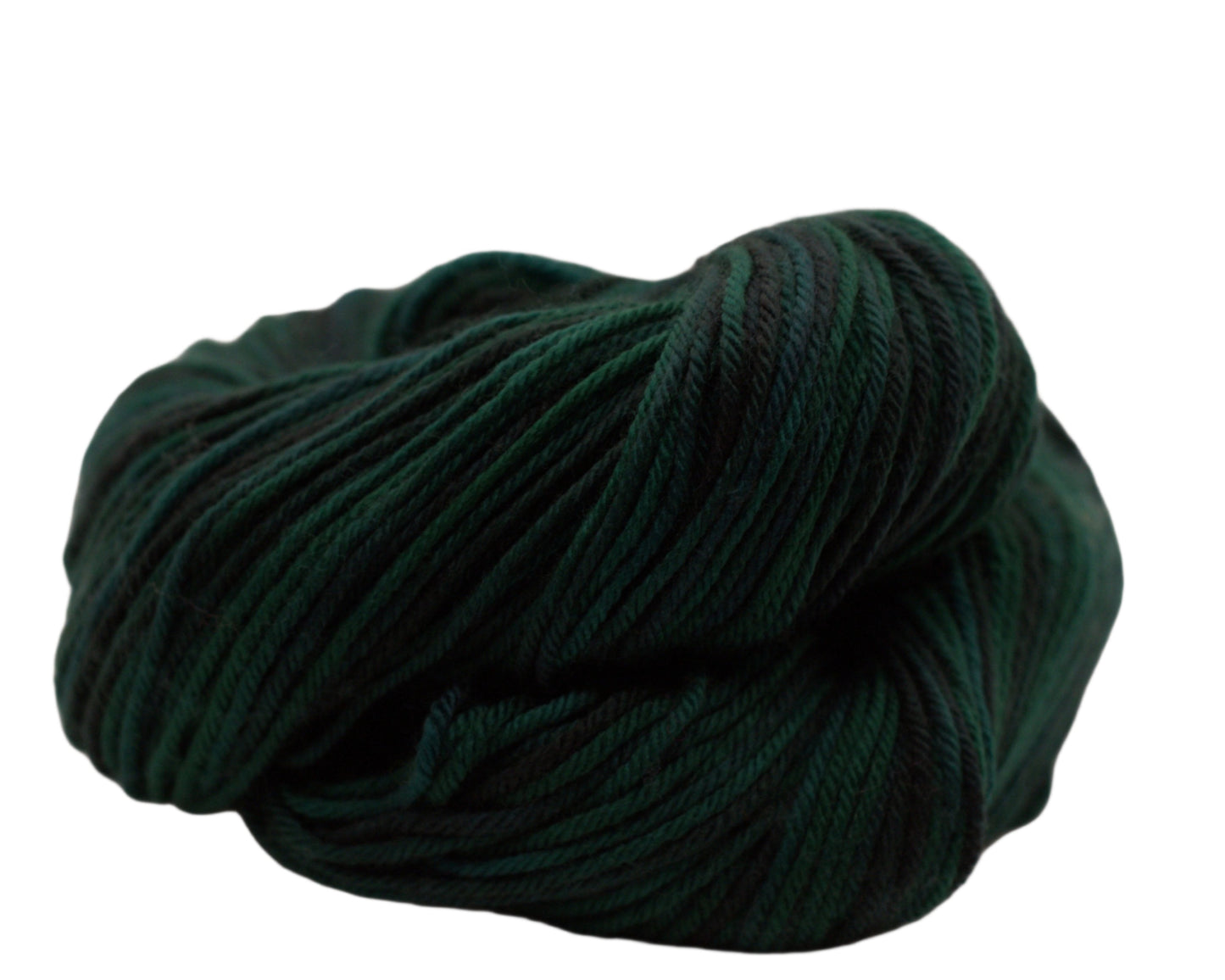 curled up skein variegated dark green and black yarn on white background.