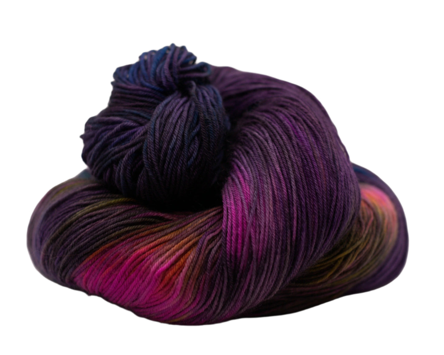 one curled up skein variegated dark purple yarn with neon colors on white background.