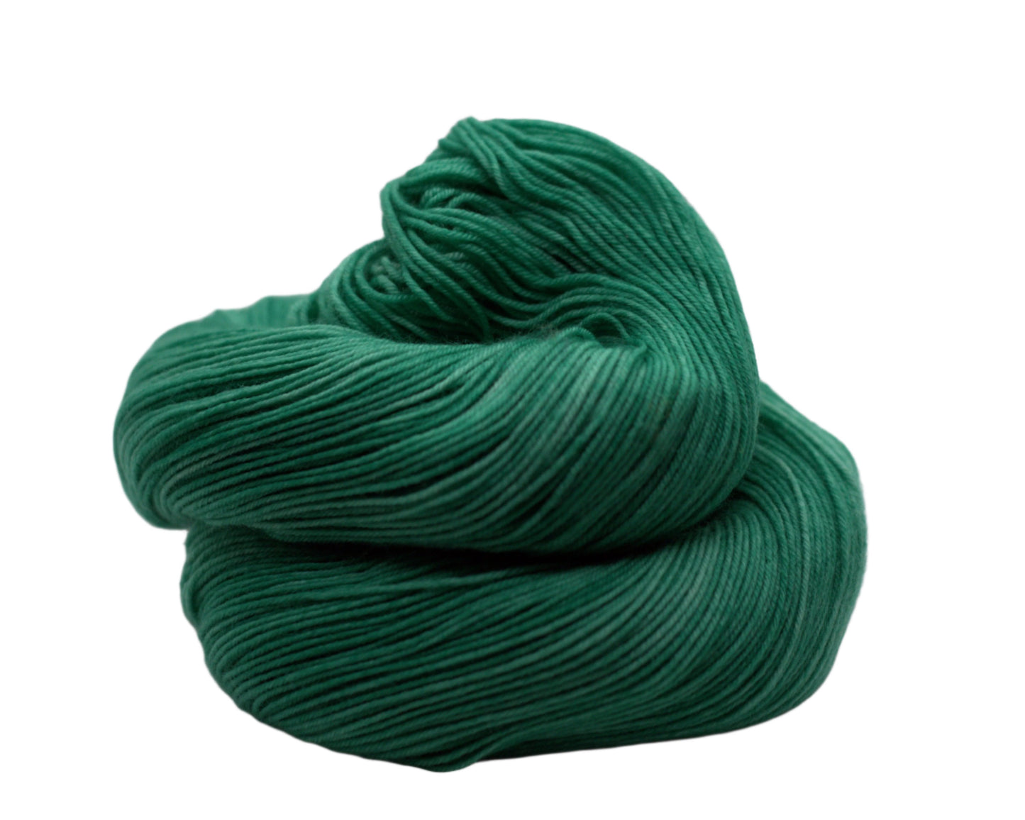 A skein of green yarn on a white background curled up in a small, neat pile.