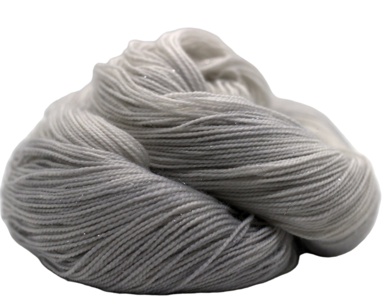One curled skein of pale silver tonal yarn on white background.