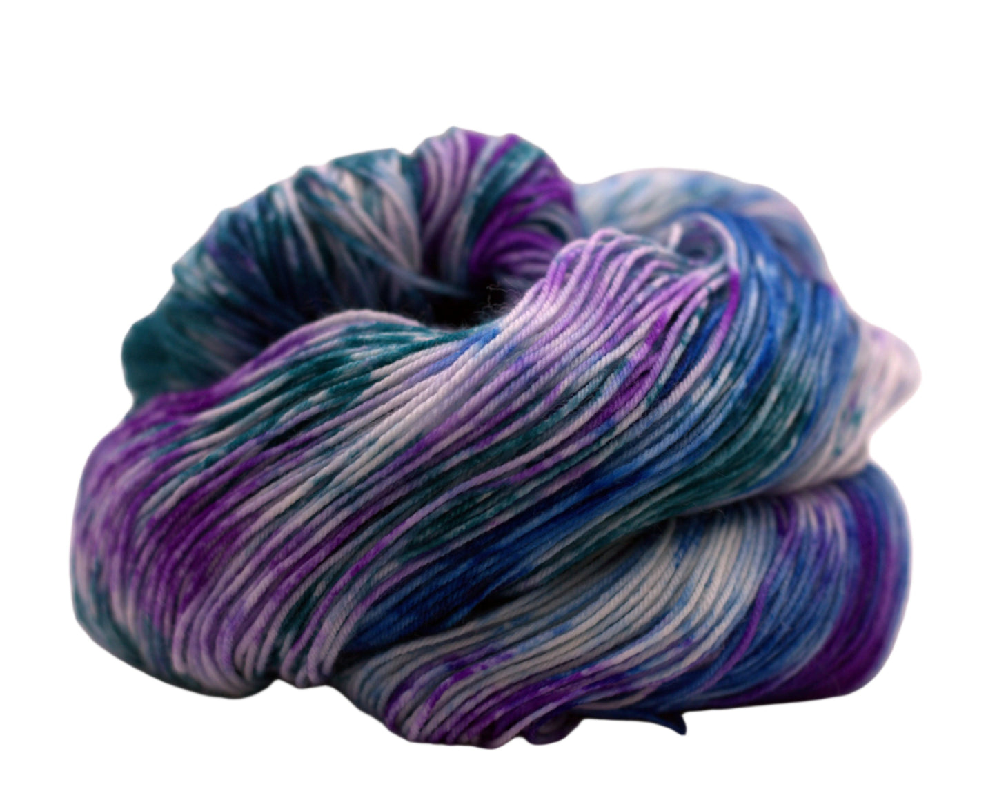 One curled skein of blue, purple and teal variegated yarn on white background.