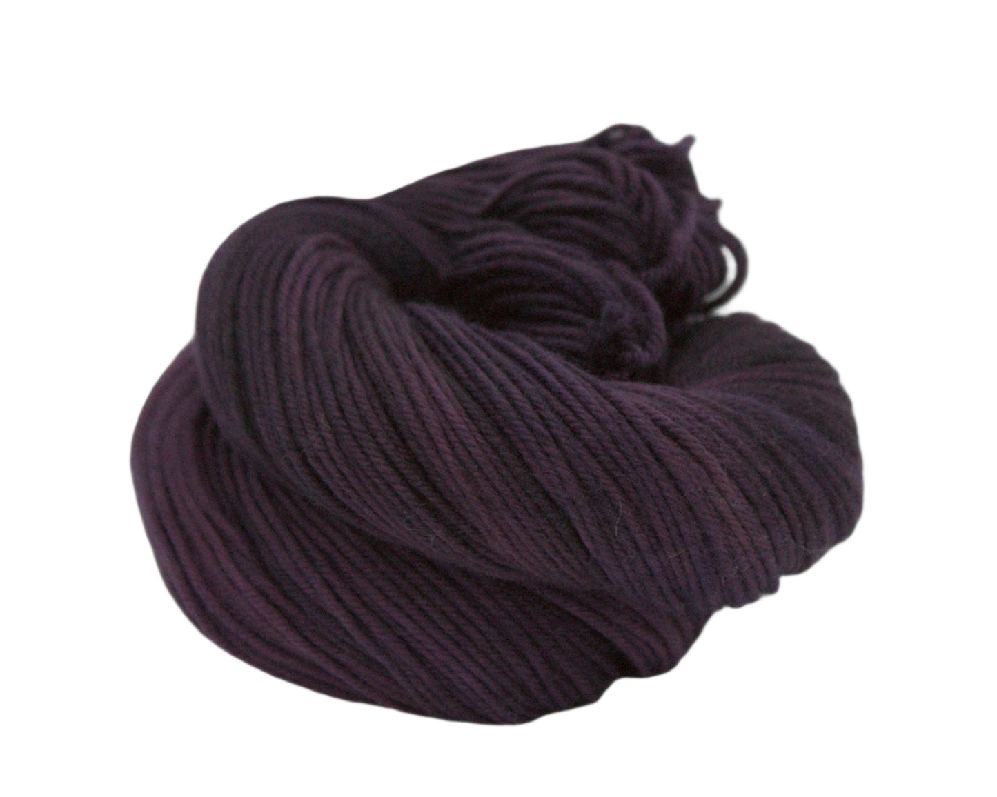 curled up skein of tonal plum yarn on white background.