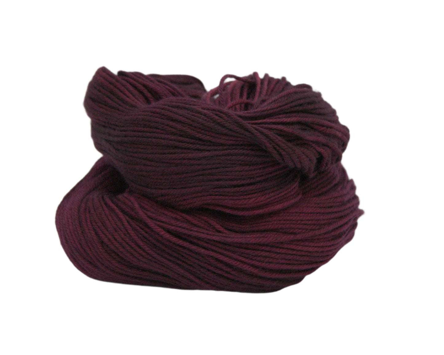 curled up skein of tonal burgundy yarn on white background.