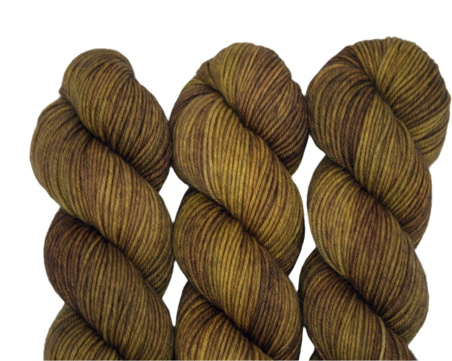 close up of three twisted skeins tonal dark gold yarn on white background.