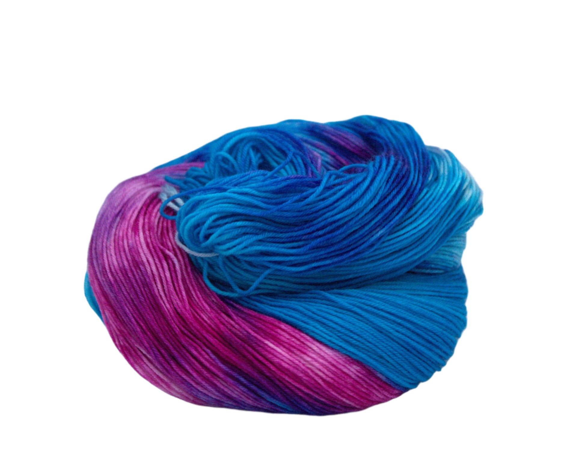 One skein of curled up turquoise, magenta, and purple variegated yarn on a white background.