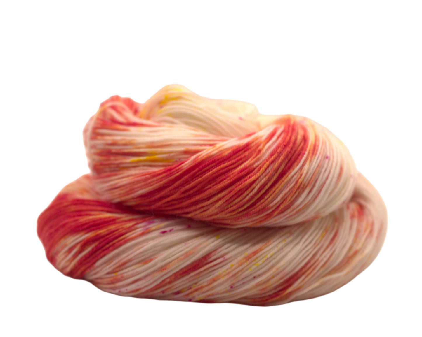 One curled skein orange, yellow and magenta speckled yarn on white background.