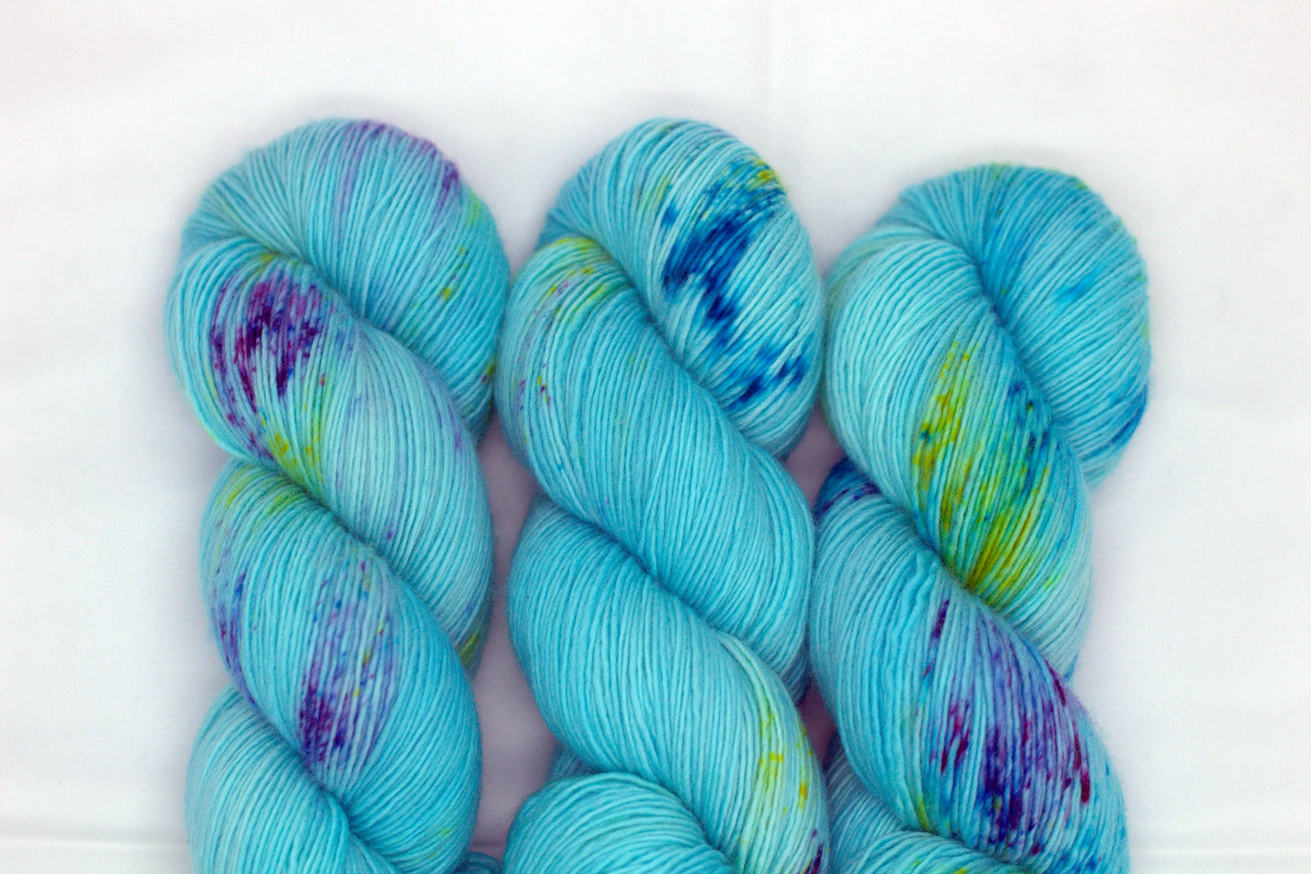 Turquoise Speckle, Soft Singles Fingering Weight Yarn