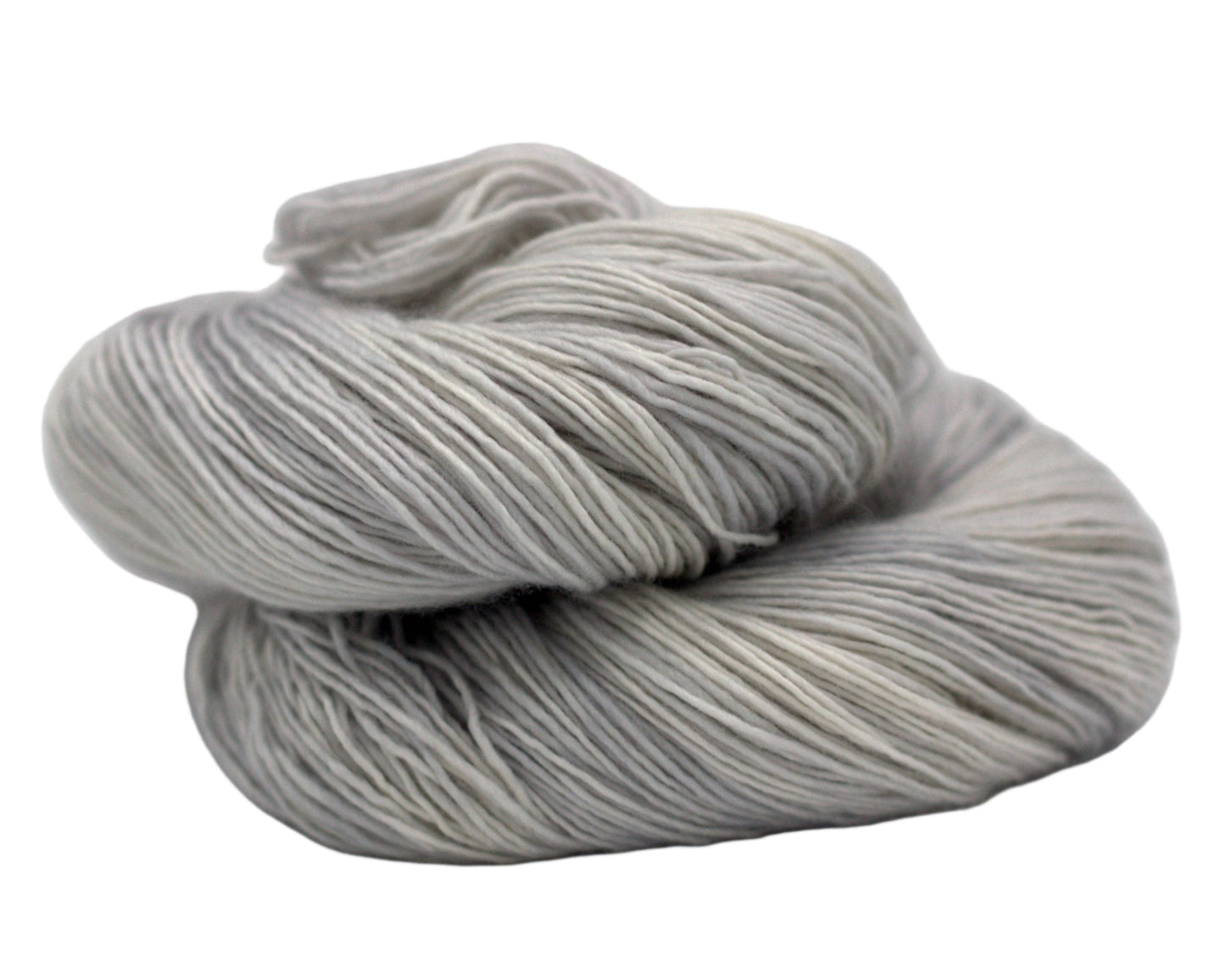 one curled up skein tonal silver yarn on white background.