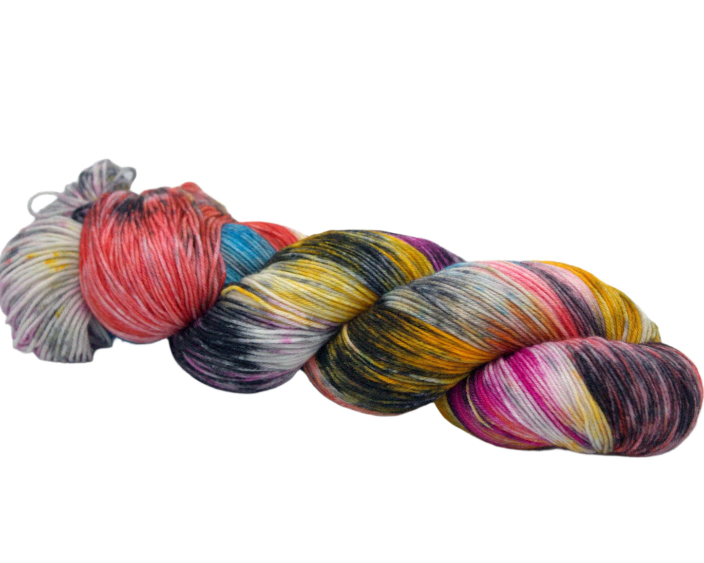 side view of one twisted skein multicolored speckled yarn on white background.