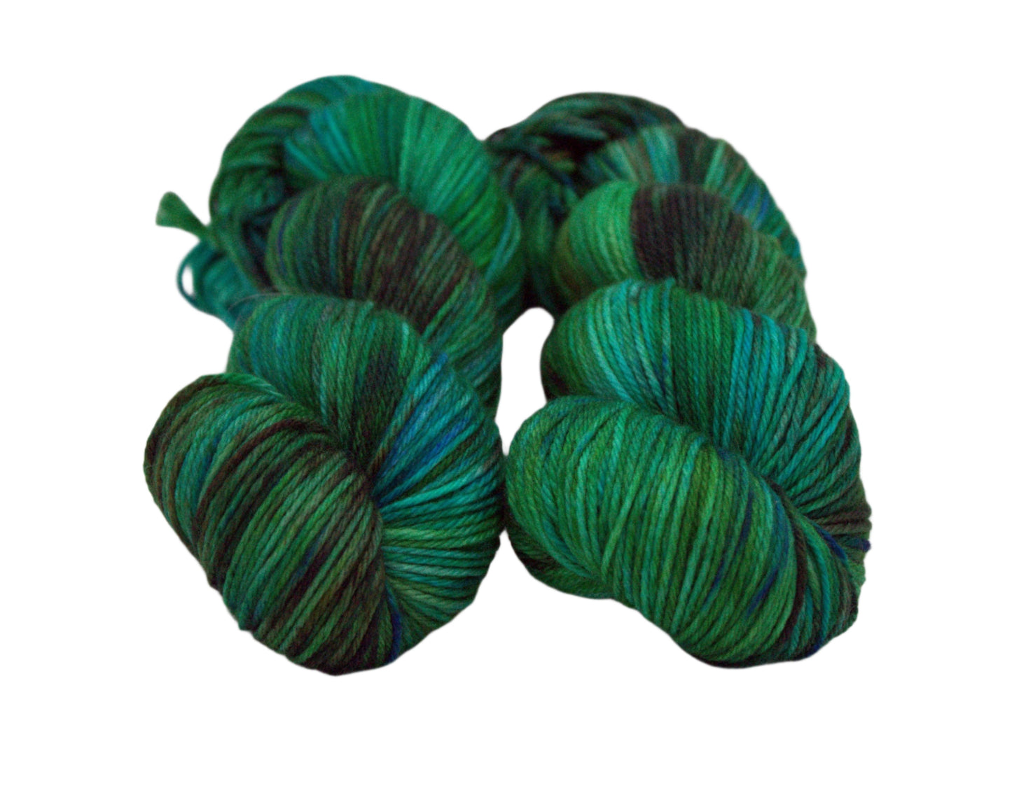 two twisted skeins variegated green and brown yarn on white background.