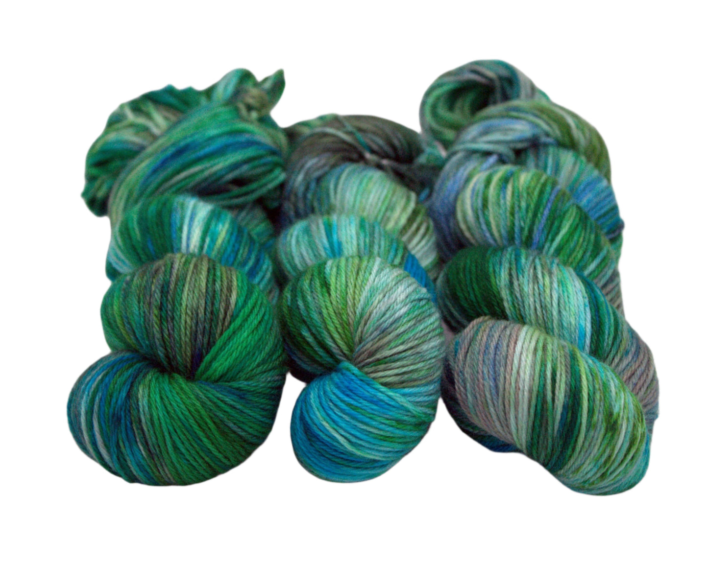 three twisted skeins variegated green, blue and brown yarn on white background.