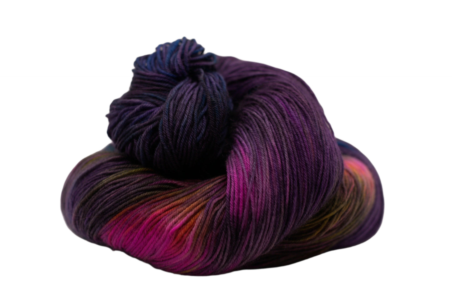 one curled up skein variegated dark purple yarn with neon colors on white background.