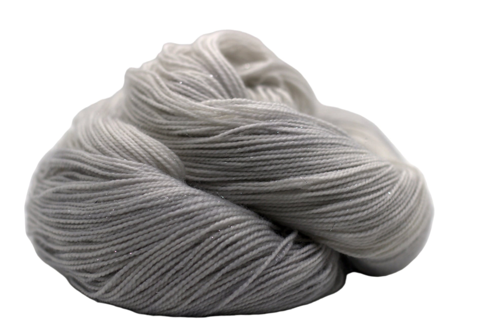 One curled skein of pale silver tonal yarn on white background.