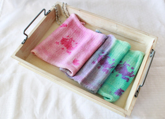 top view of sock blank in pink, lavender and light blue with Unicorn stencils